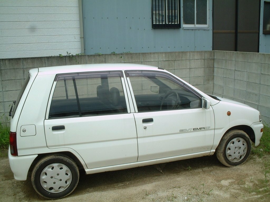Сбоку