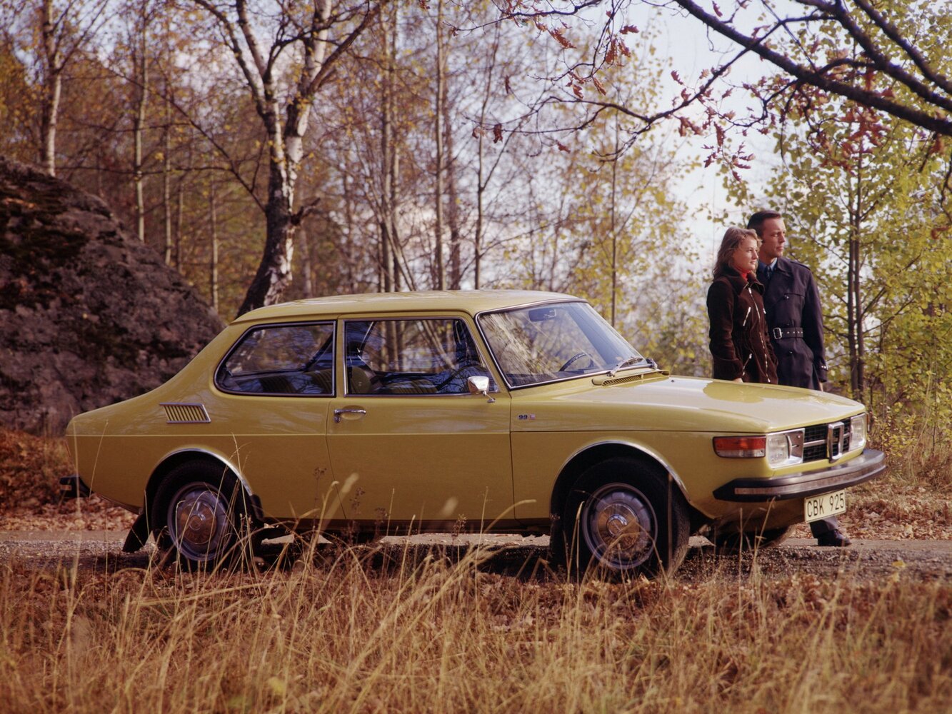 Сбоку
