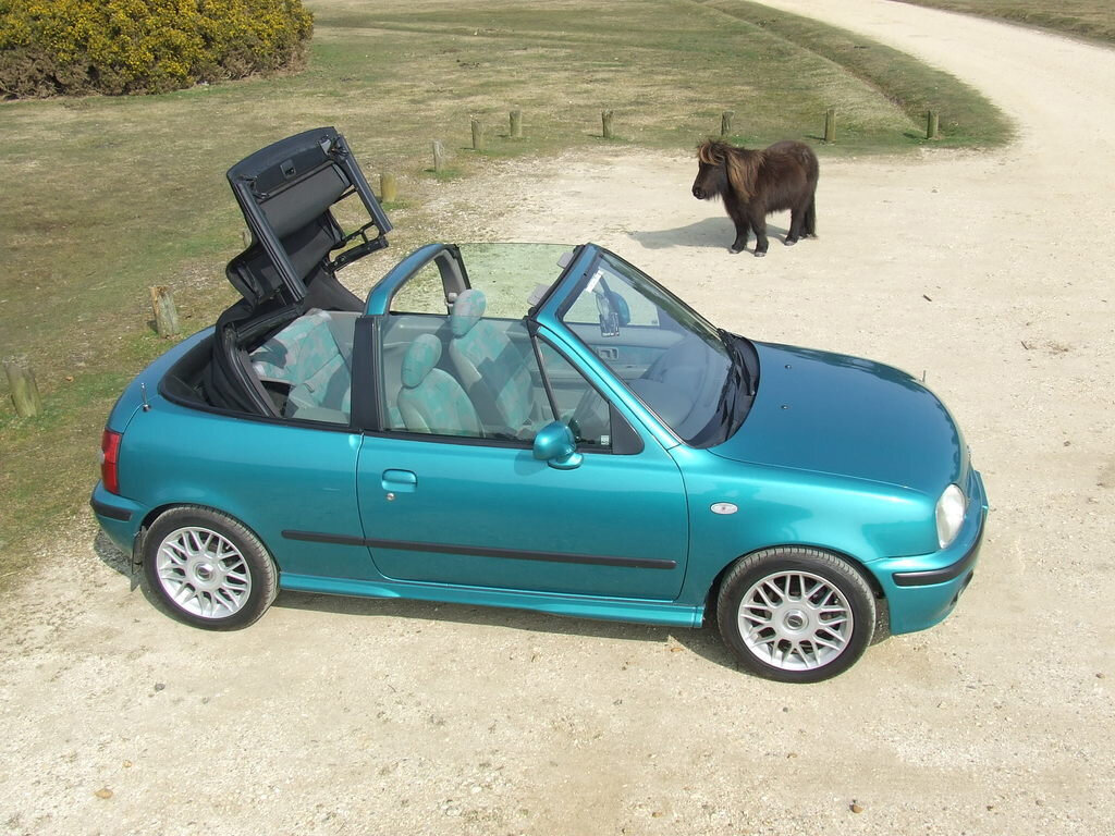 Сбоку