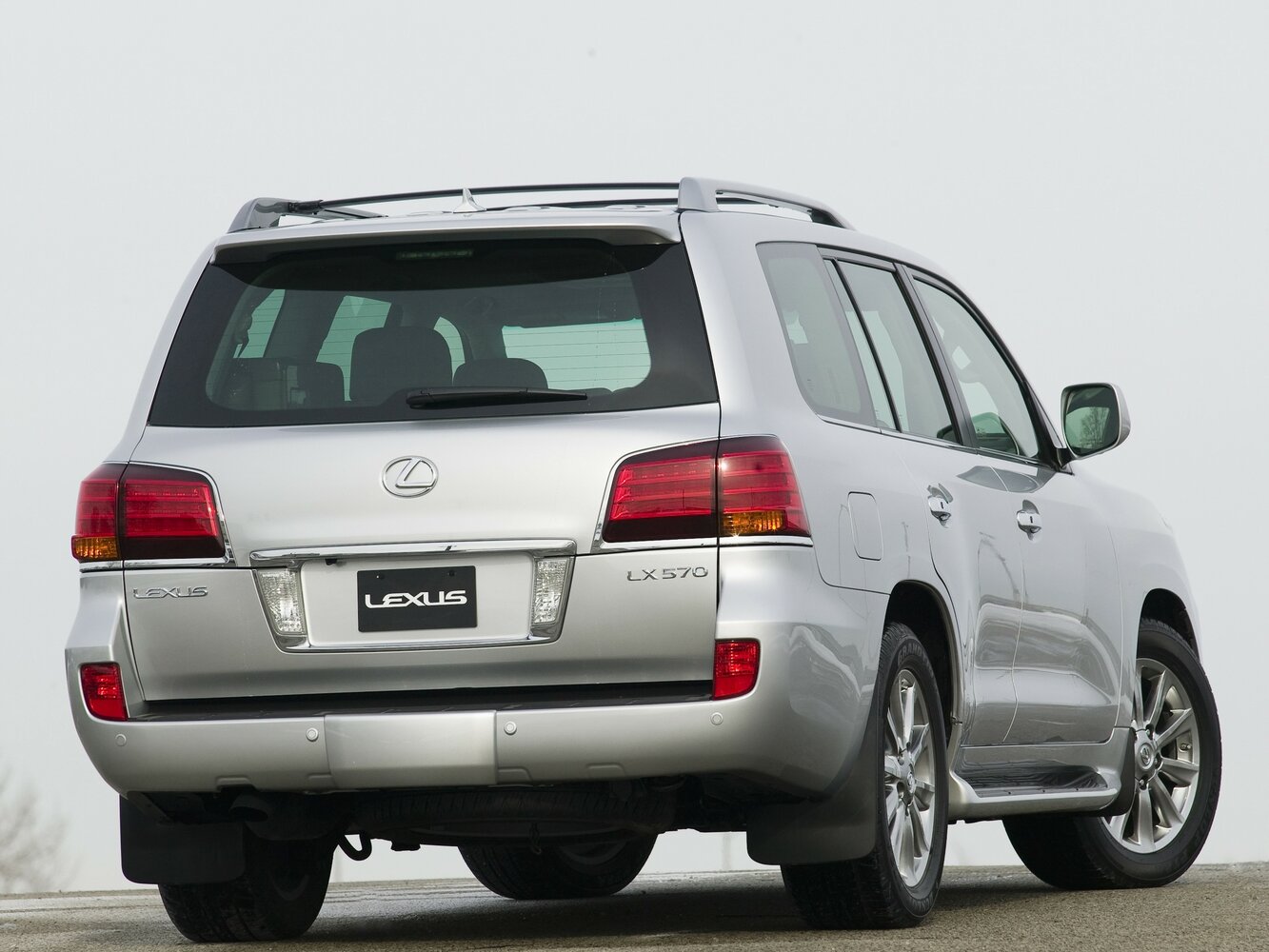 Сзади