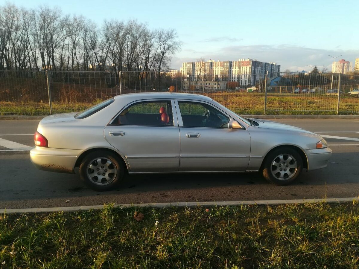 Сбоку