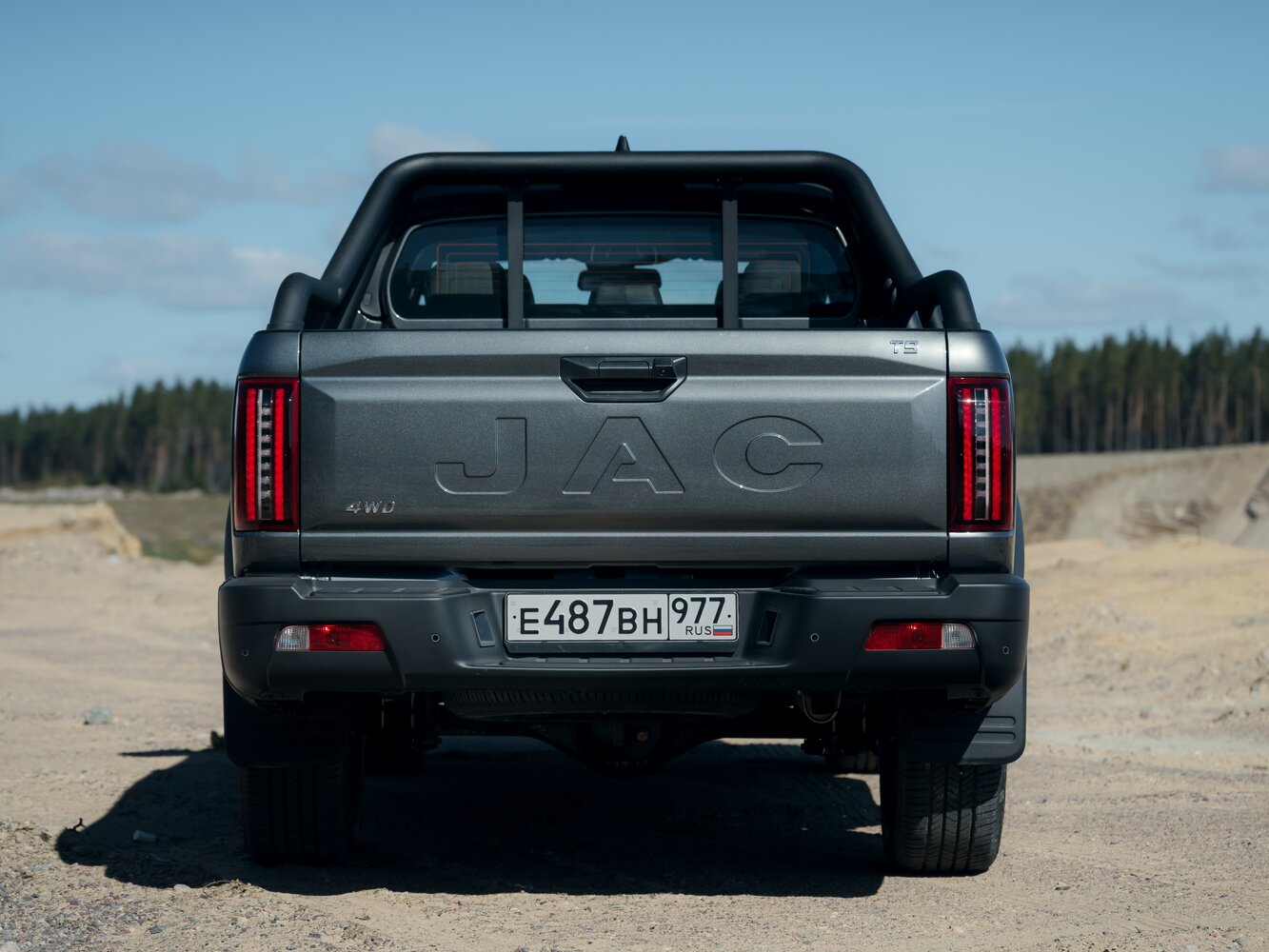Сзади