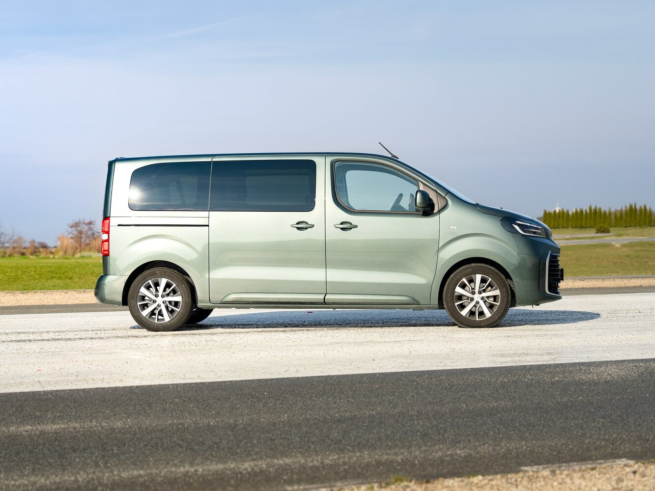 Сбоку