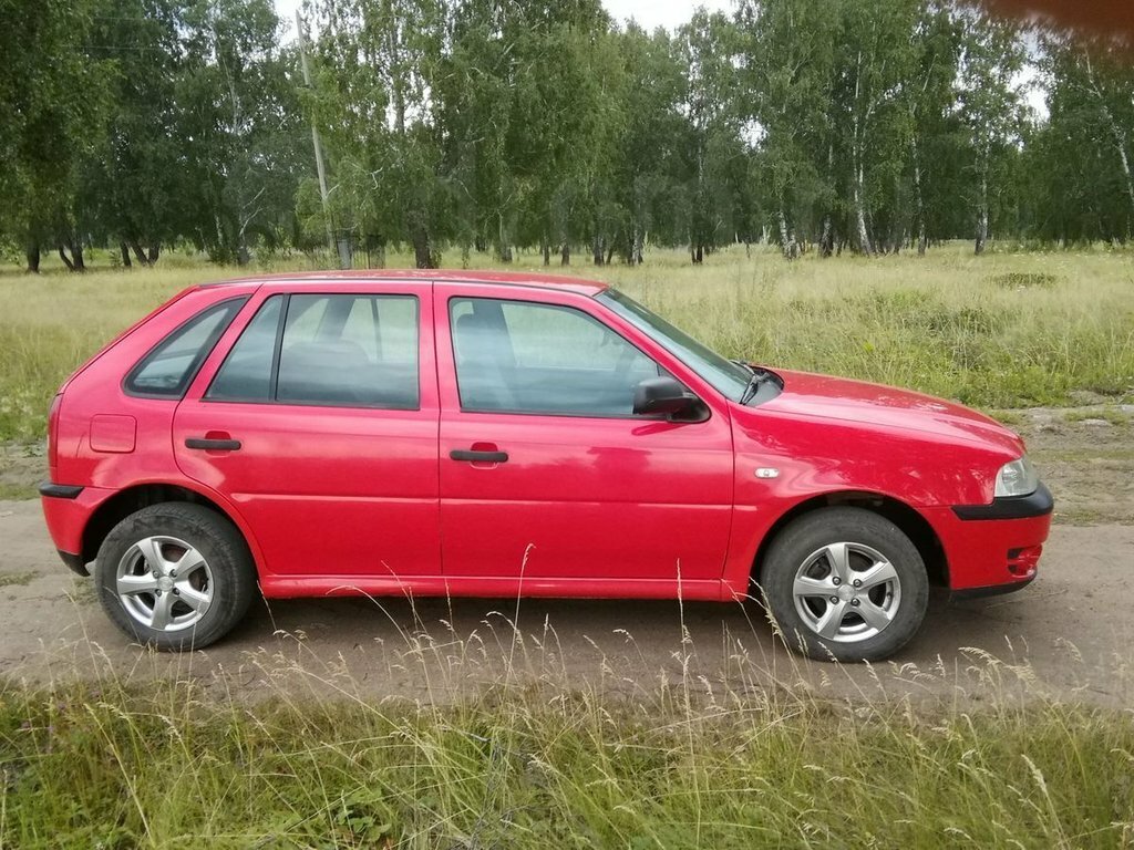 Сбоку