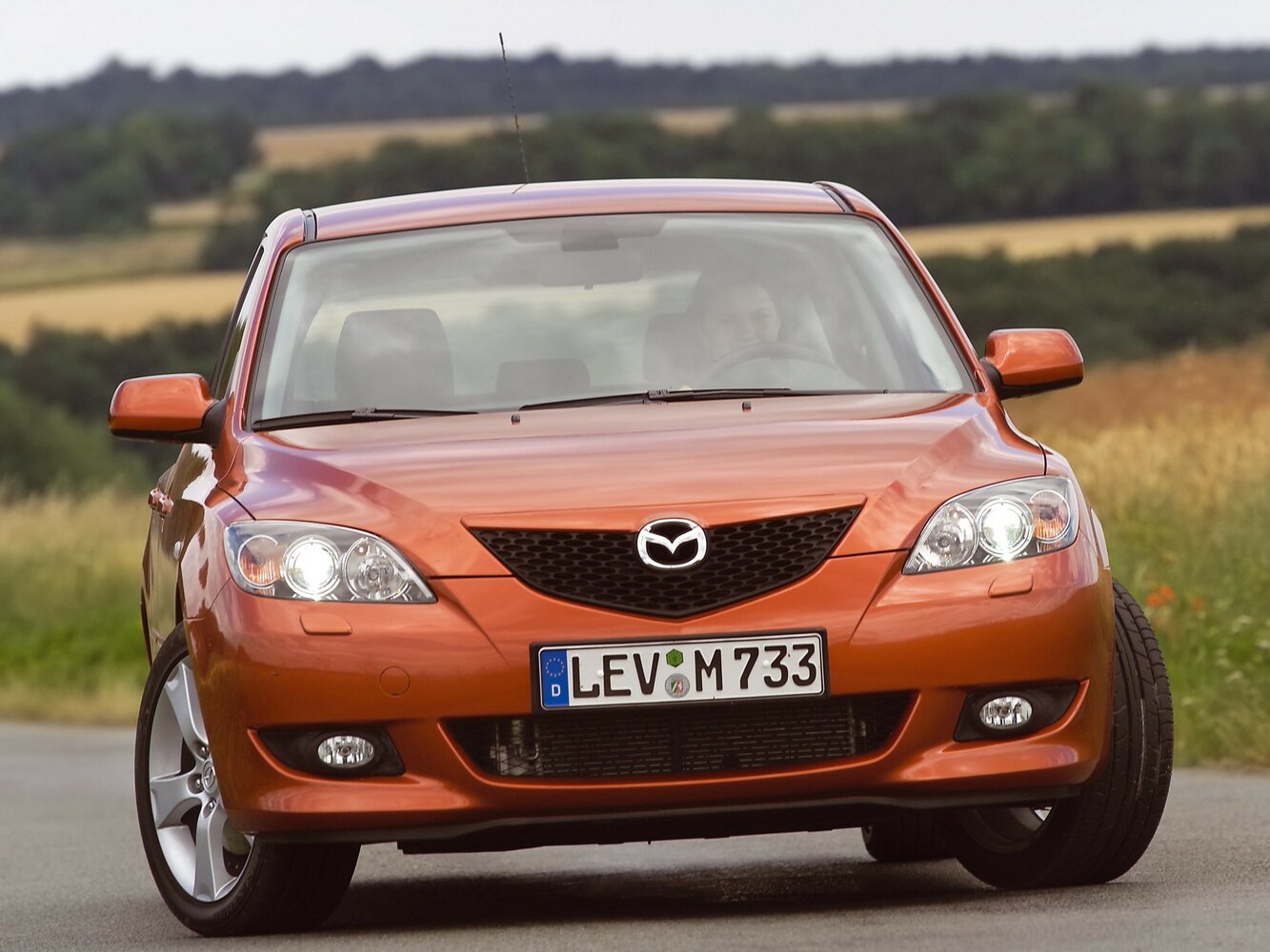 Спереди