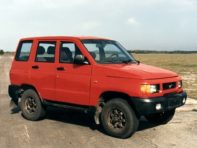 Сбоку