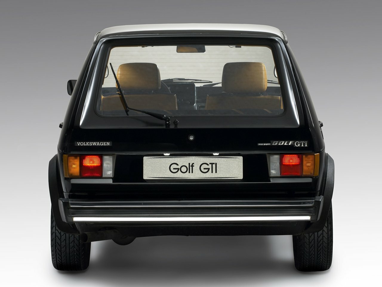 Сзади