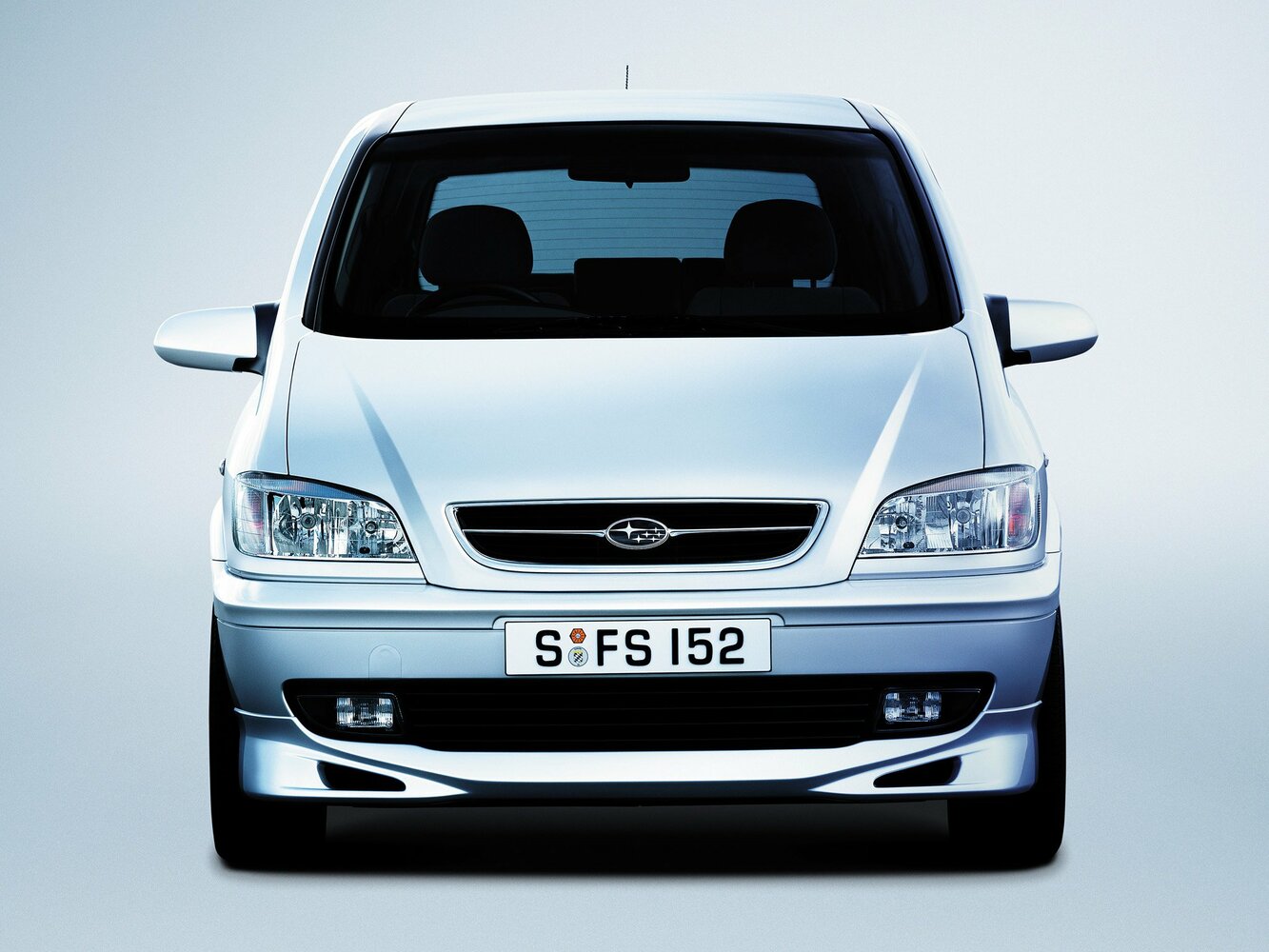 Спереди