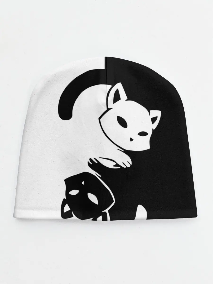 Детская шапка / Черный и белый кот кувыркаются.