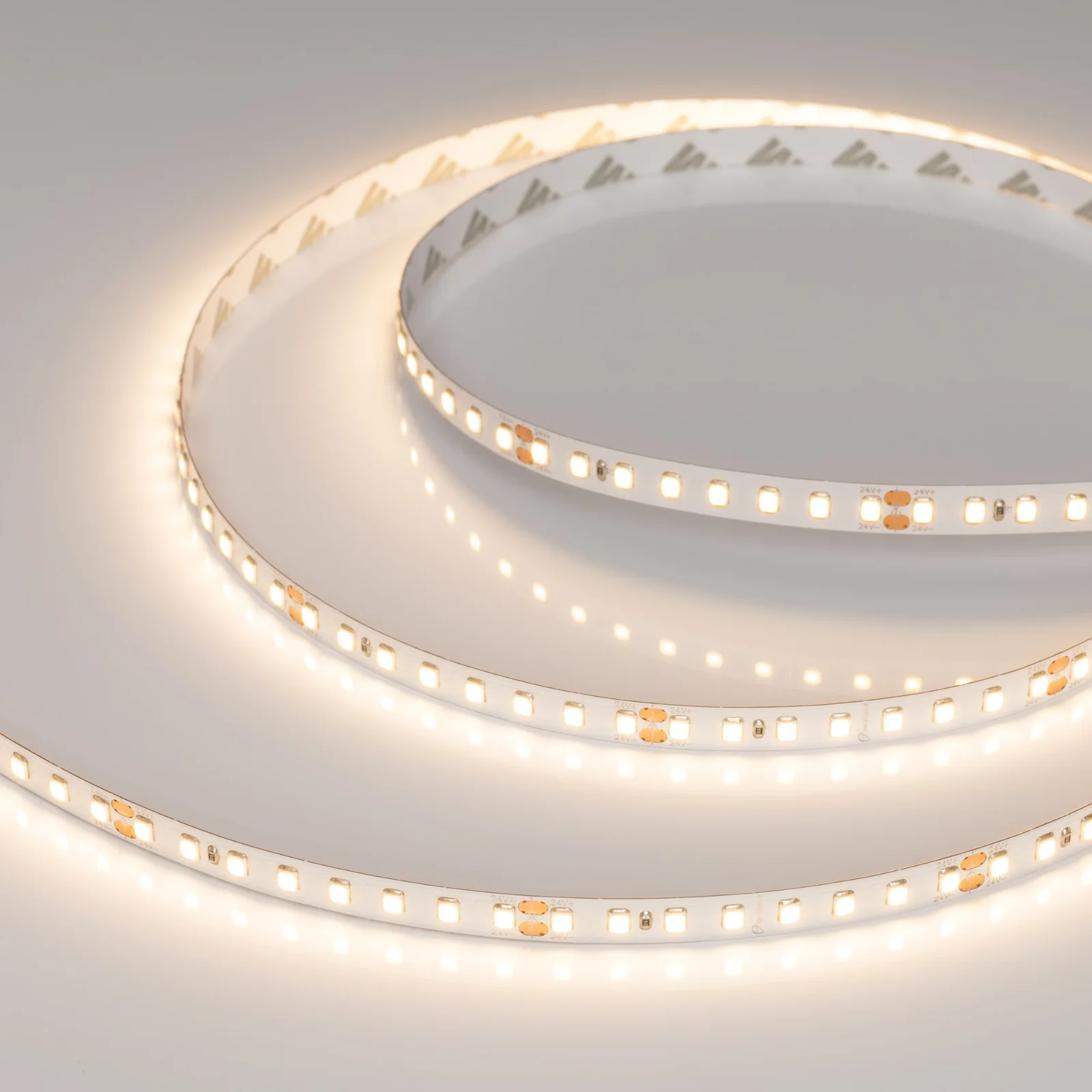 Светодиодная лента Arlight RT-A128-8mm 24V Warm3000 (9.6 Вт/м, IP20, 2835, 5 м)