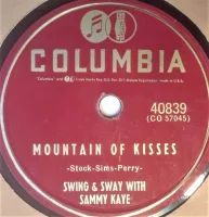 Mountain Of Kisses / I Met A Girl