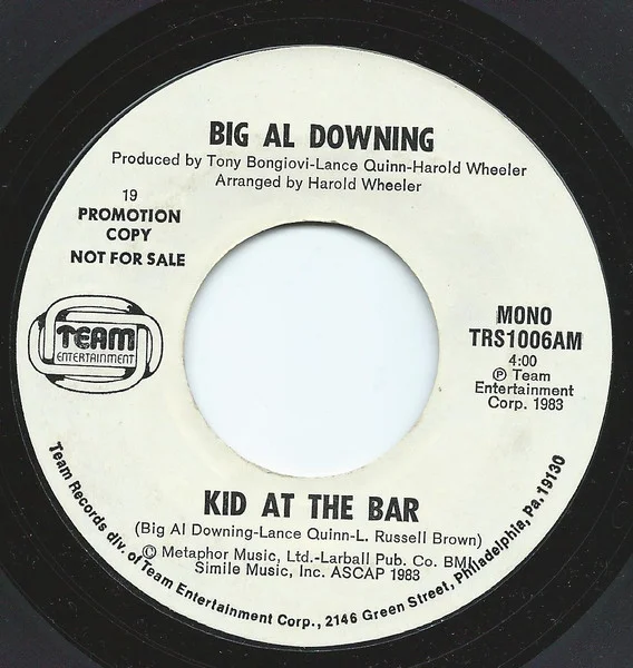 Kid At The Bar