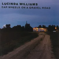 Car Wheels On A Gravel Road