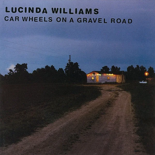 Car Wheels On A Gravel Road