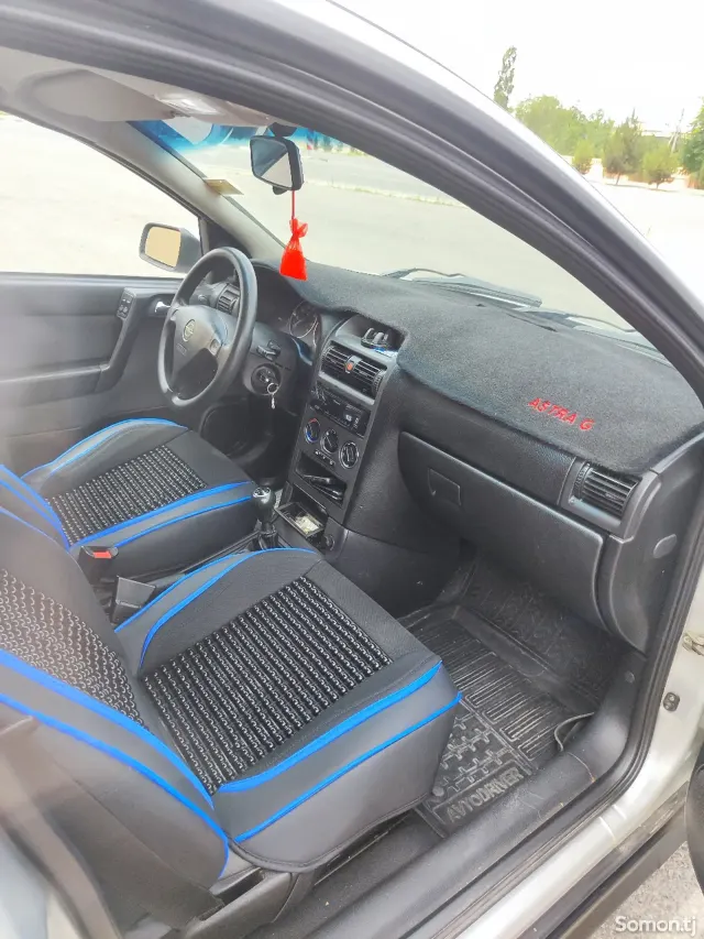 Opel Astra G 2003 · 1.6 MT