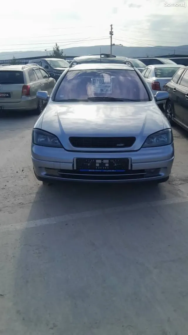 Opel Astra G 2004 · 1.6 MT