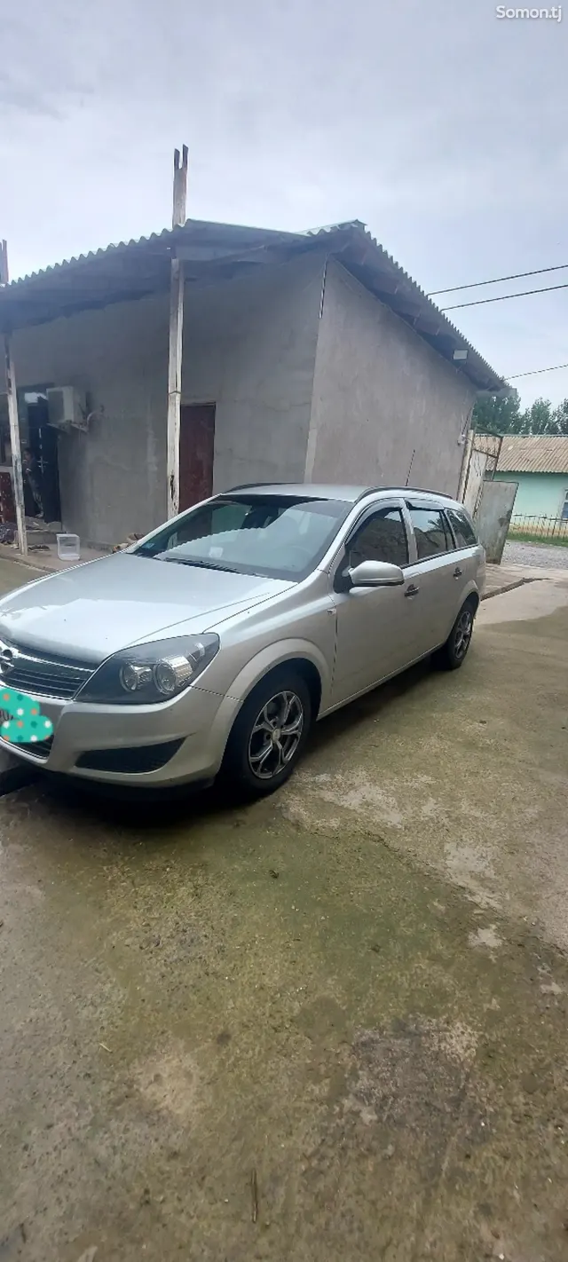 Opel Astra H 2011 · 1.6 MT