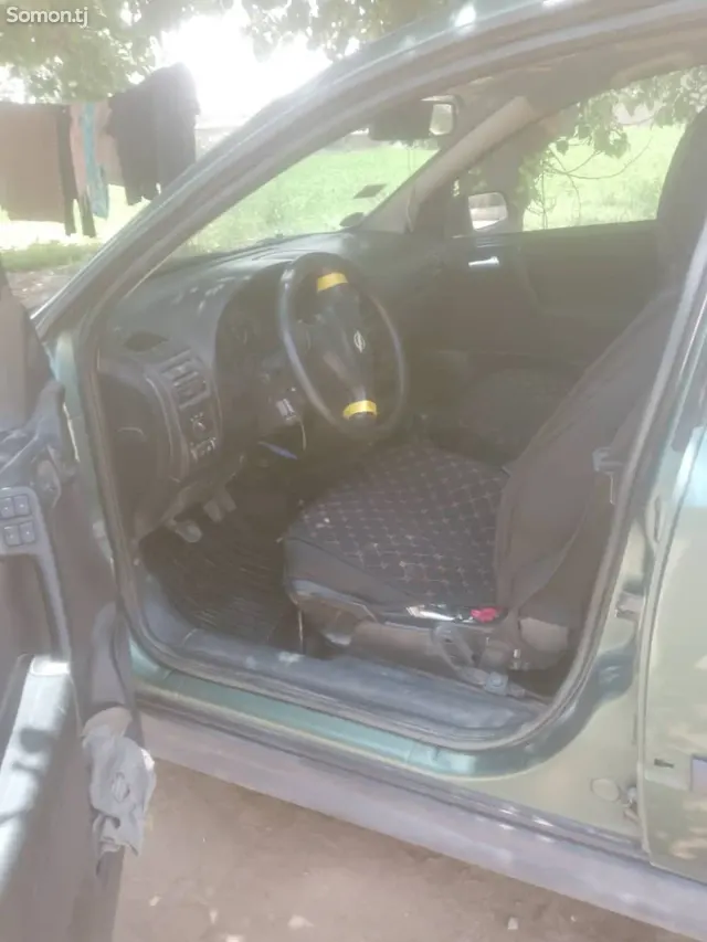 Opel Astra J 1998 · 1.6 MT