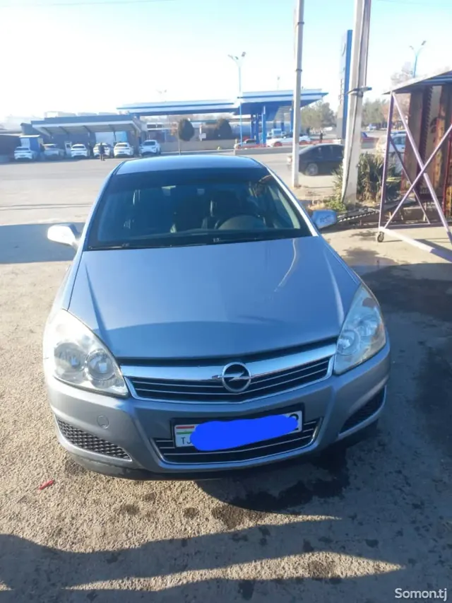 Opel Astra H 2009 · 1.6 MT