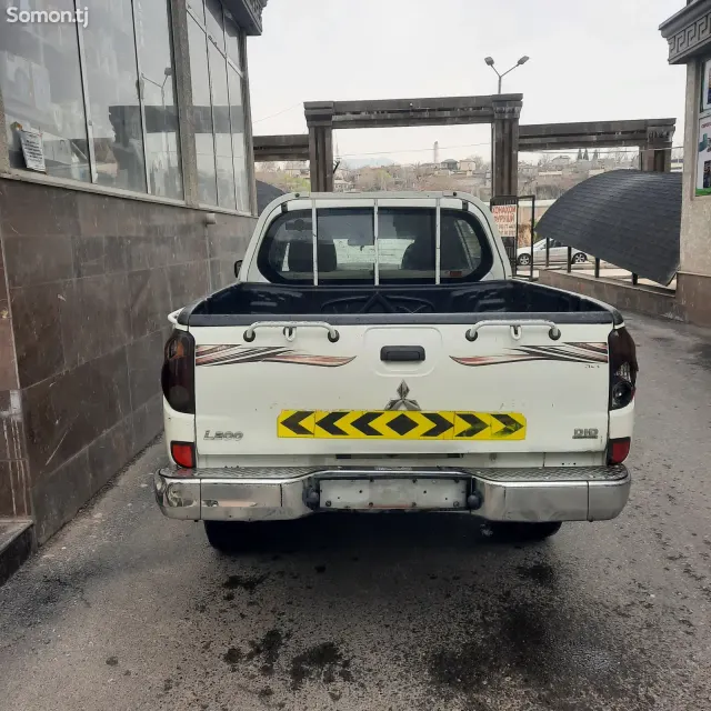 Mitsubishi L200 2009 · 2.4 MT
