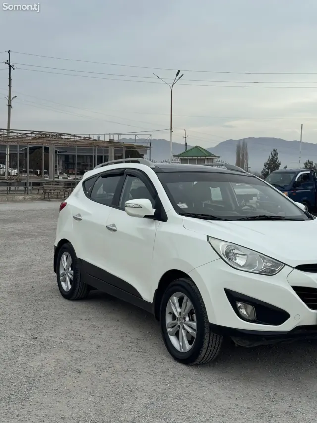 Hyundai Tucson 2012 · 2.0 AT