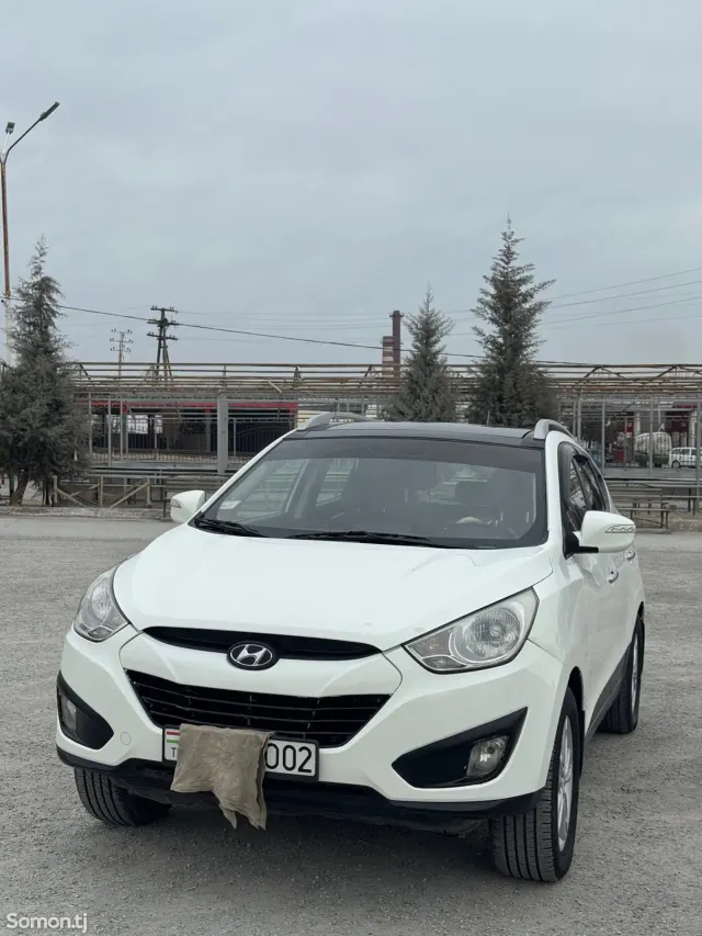Hyundai Tucson 2012 · 2.0 AT
