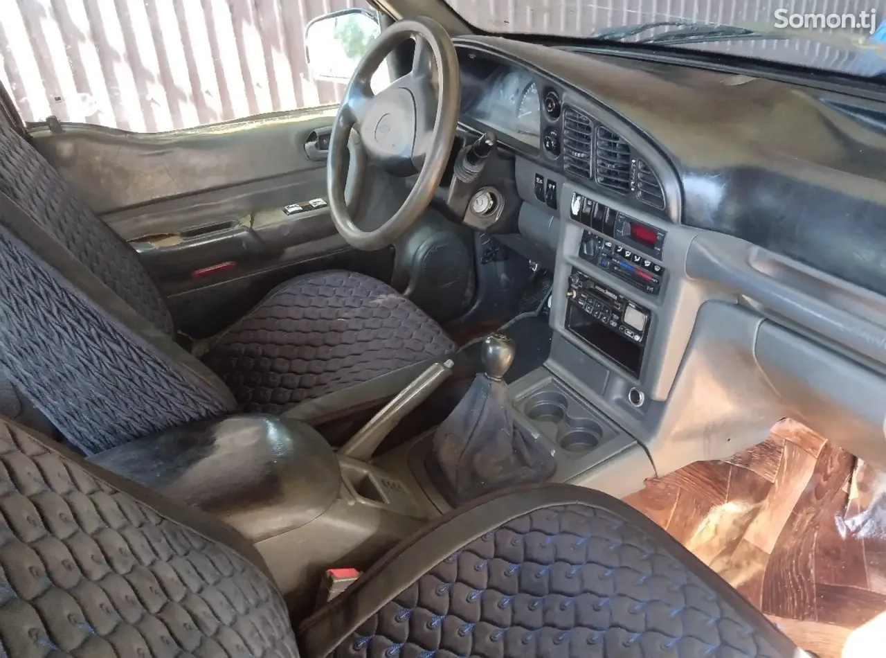 Ssang Yong Musso 1997 · 2.9 MT