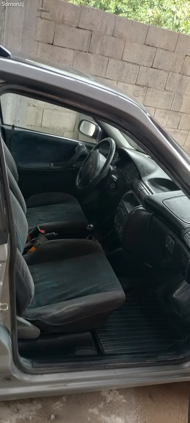 Opel Astra F 1996 · 1.6 MT