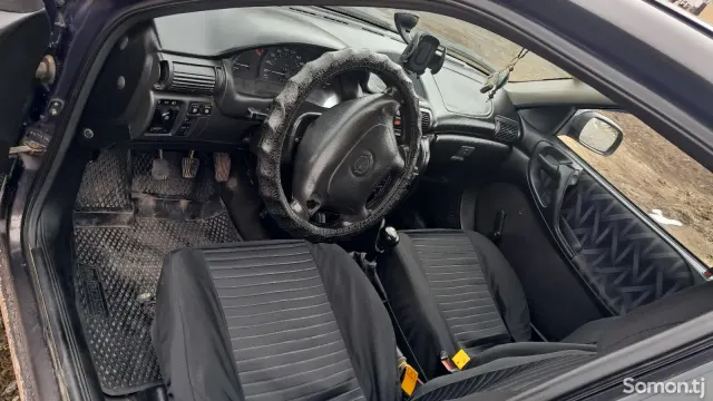 Opel Astra F 1995 · 1.6 MT