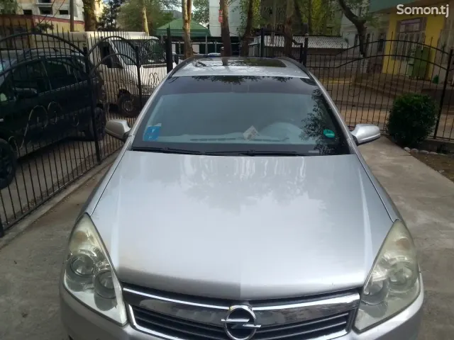 Opel Astra H 2009 · 1.6 MT