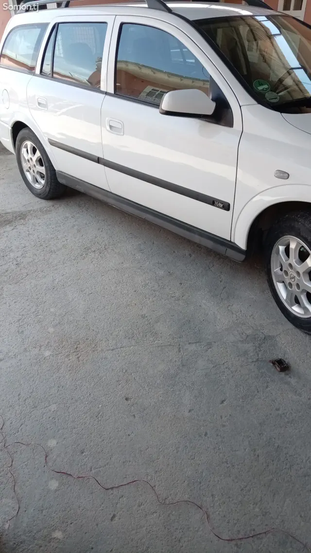 Opel Astra G 2003 · 1.6 MT