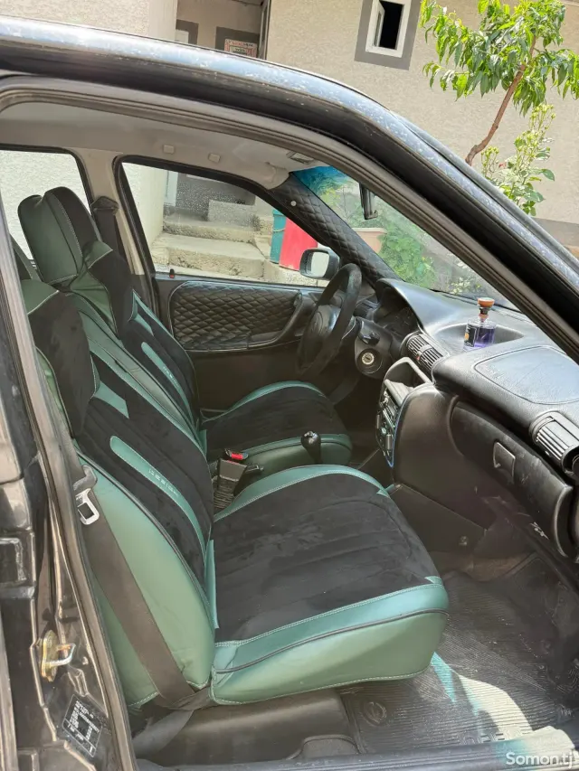 Opel Astra F 1997 · 1.6 MT