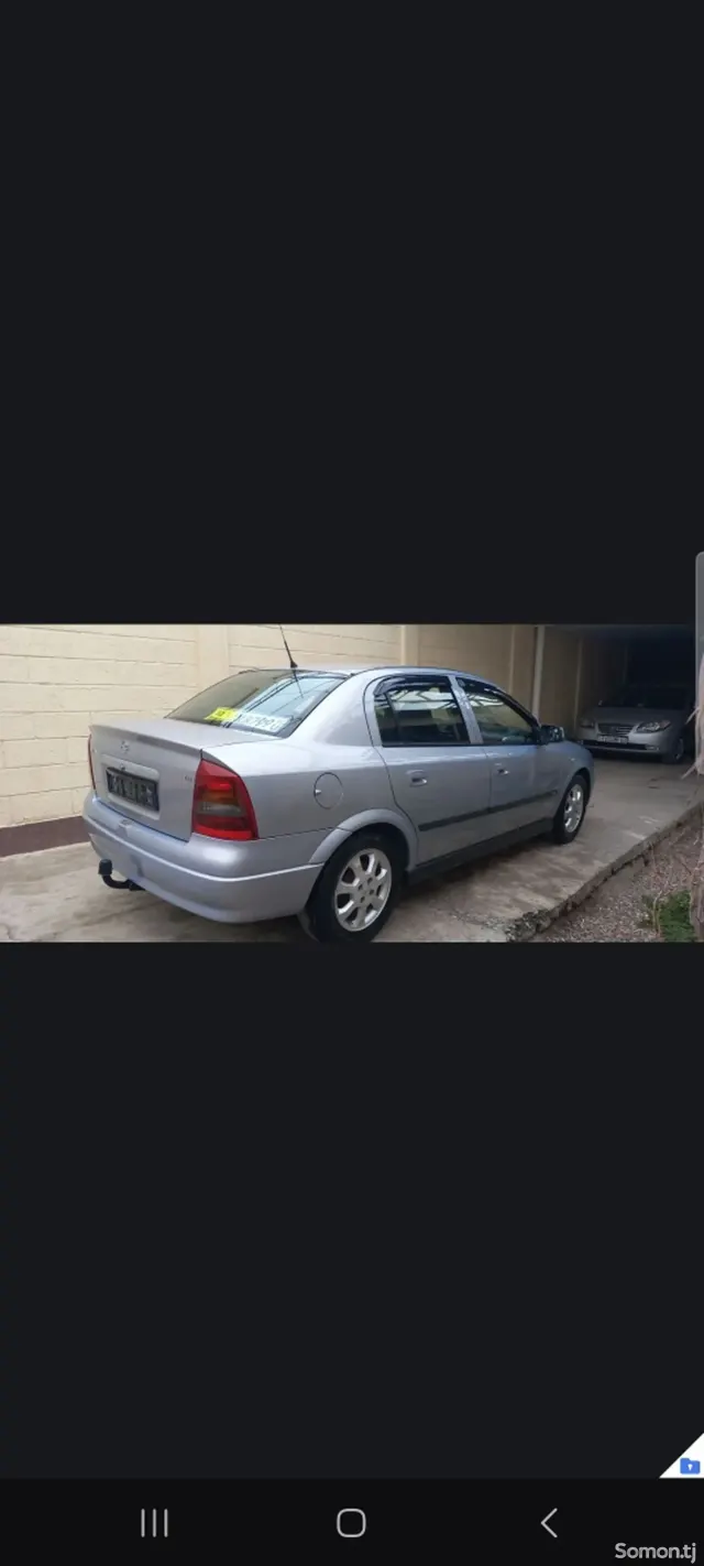Opel Astra G 2003 · 1.6 MT