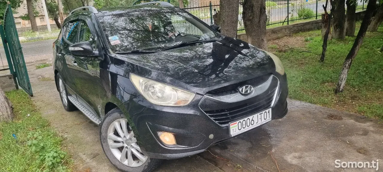 Hyundai Tucson 2011 · 2.0 AT