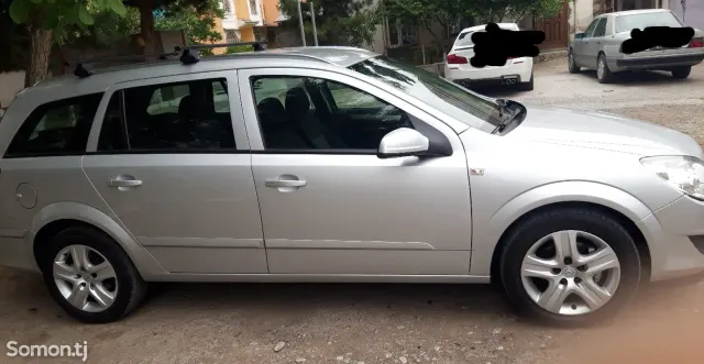 Opel Astra H 2008 · 1.6 MT