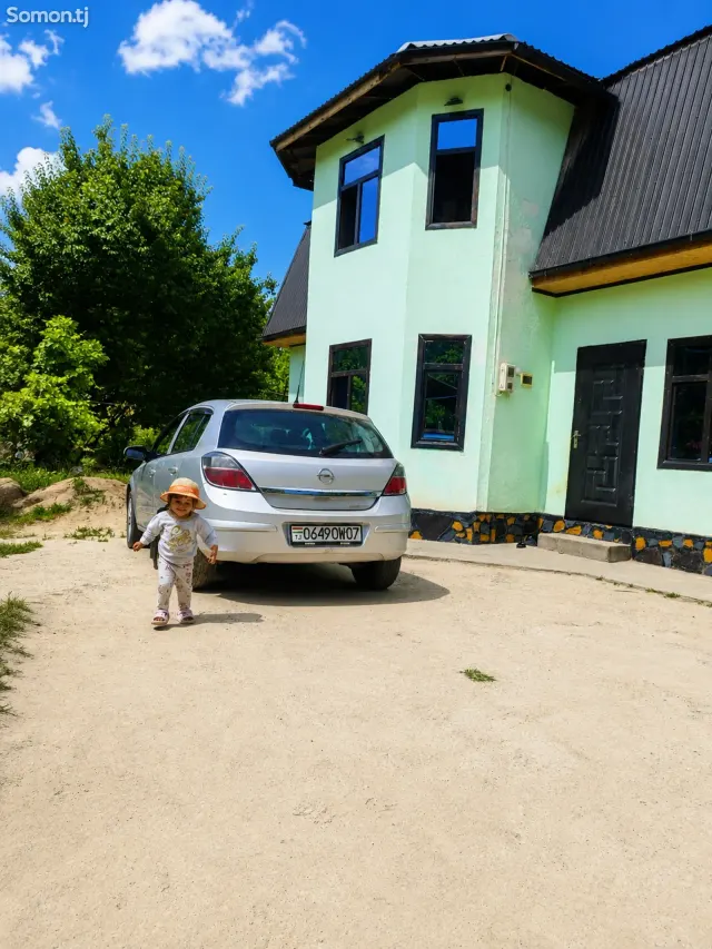 Opel Astra H 2008 · 1.8 MT