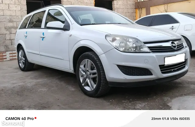 Opel Astra H 2008 · 1.6 MT