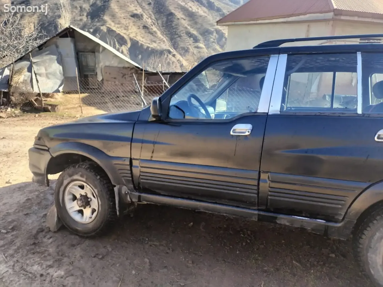 Ssang Yong Musso 1997 · 2.9 MT