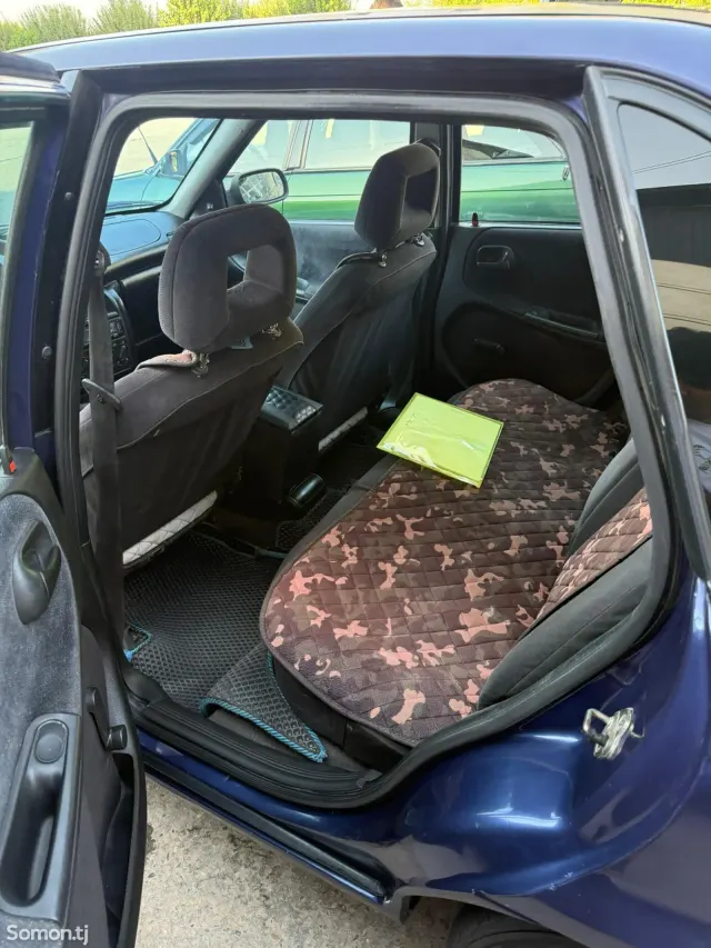 Opel Astra F 1995 · 1.6 MT