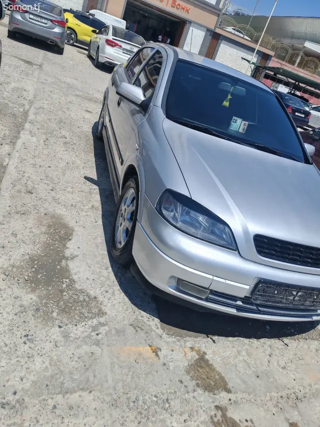 Opel Astra G 2002 · 1.6 MT