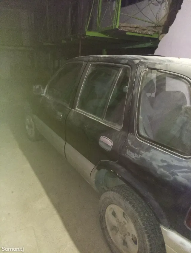 Kia Sportage 1990 · 2.0 MT