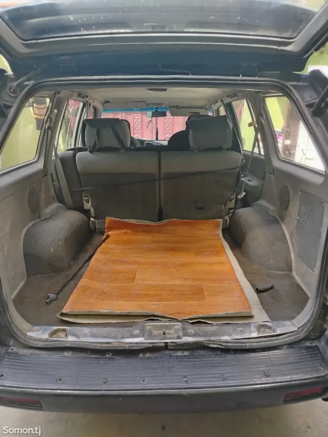 Ssang Yong Musso 1995 · 2.4 MT