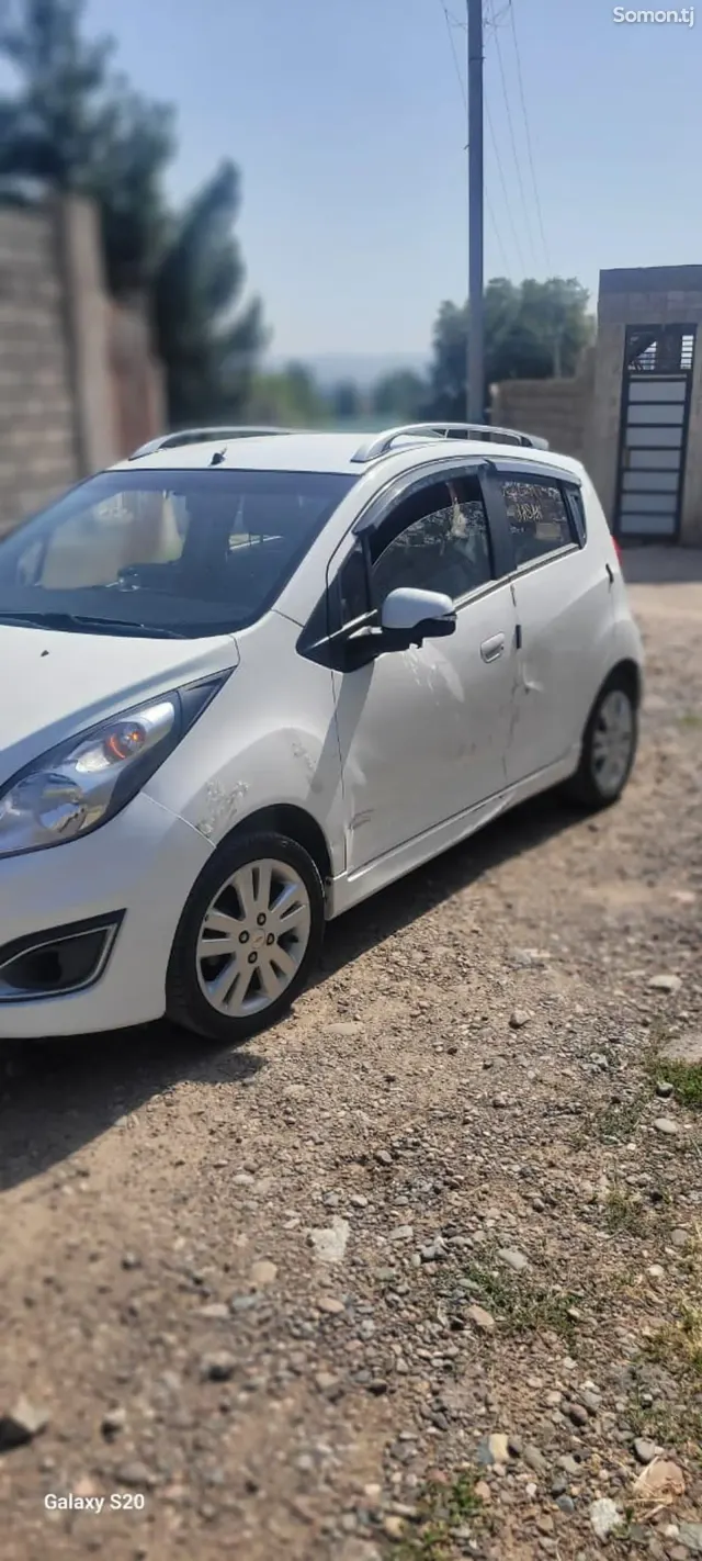 Chevrolet Spark 2014 · 1.1 AT