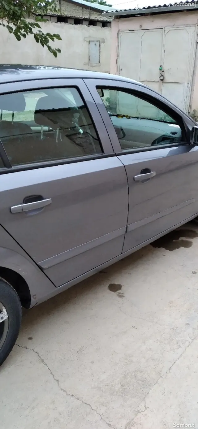 Opel Astra H 2009 · 1.6 MT