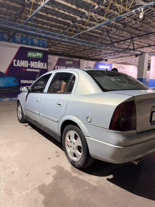 Opel Astra G 1999 · 1.6 MT
