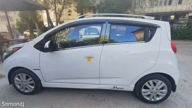 Chevrolet Spark 2015 · 1.1 AT