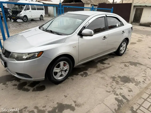 Kia Cerato 2009 · 1.6 MT