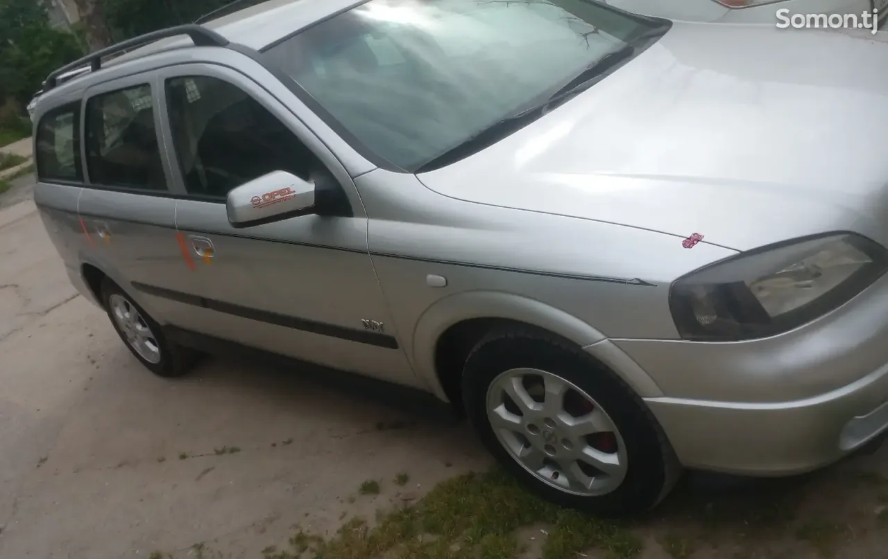 Opel Astra G 2003 · 1.6 MT