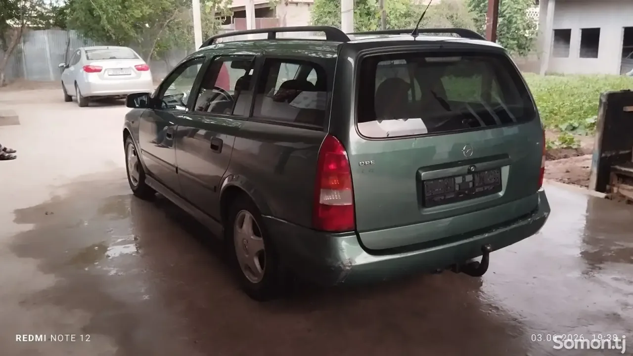 Opel Astra K 1998 · 1.6 MT