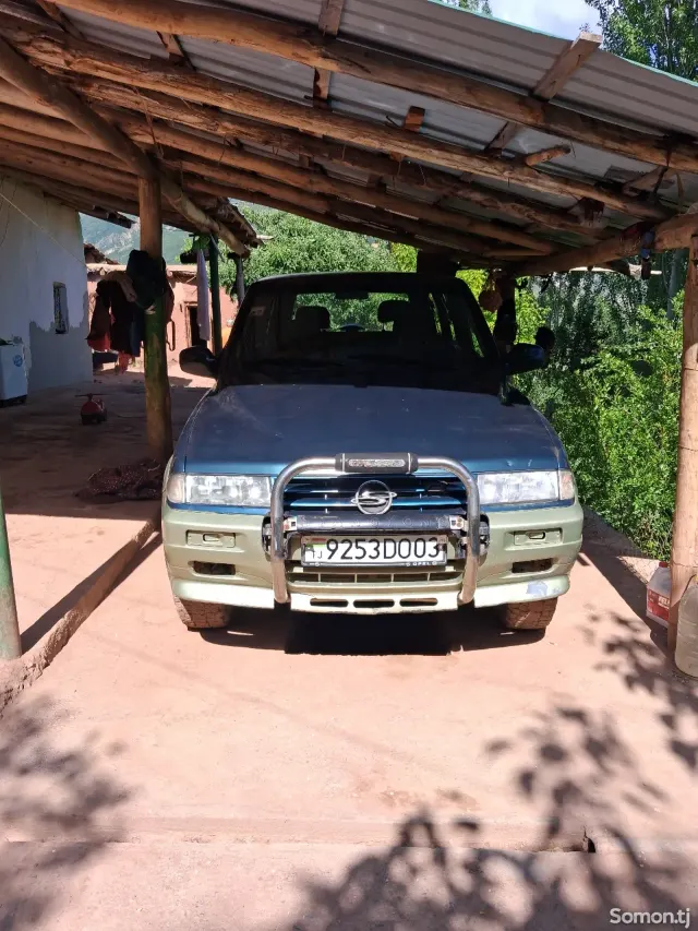 Ssang Yong Musso 1995 · 2.7 MT